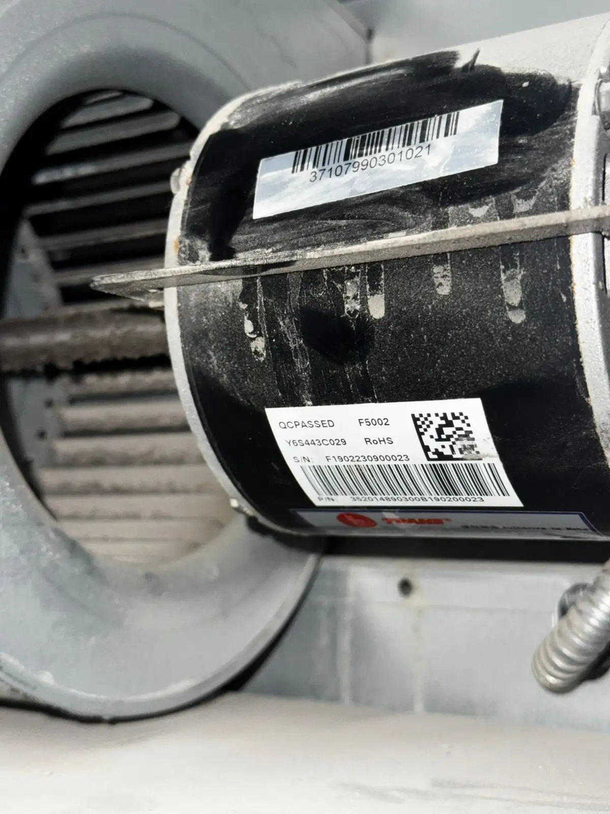 Technician checking an AC filter during maintenance in Dubai — supporting project view 2