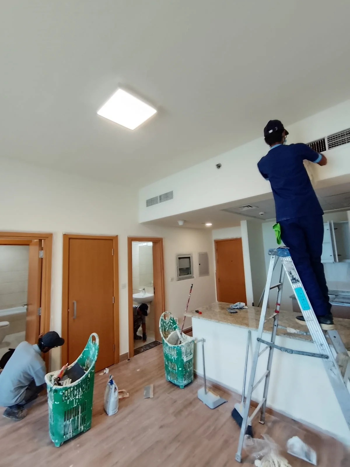 Cleaning team working inside a Dubai property