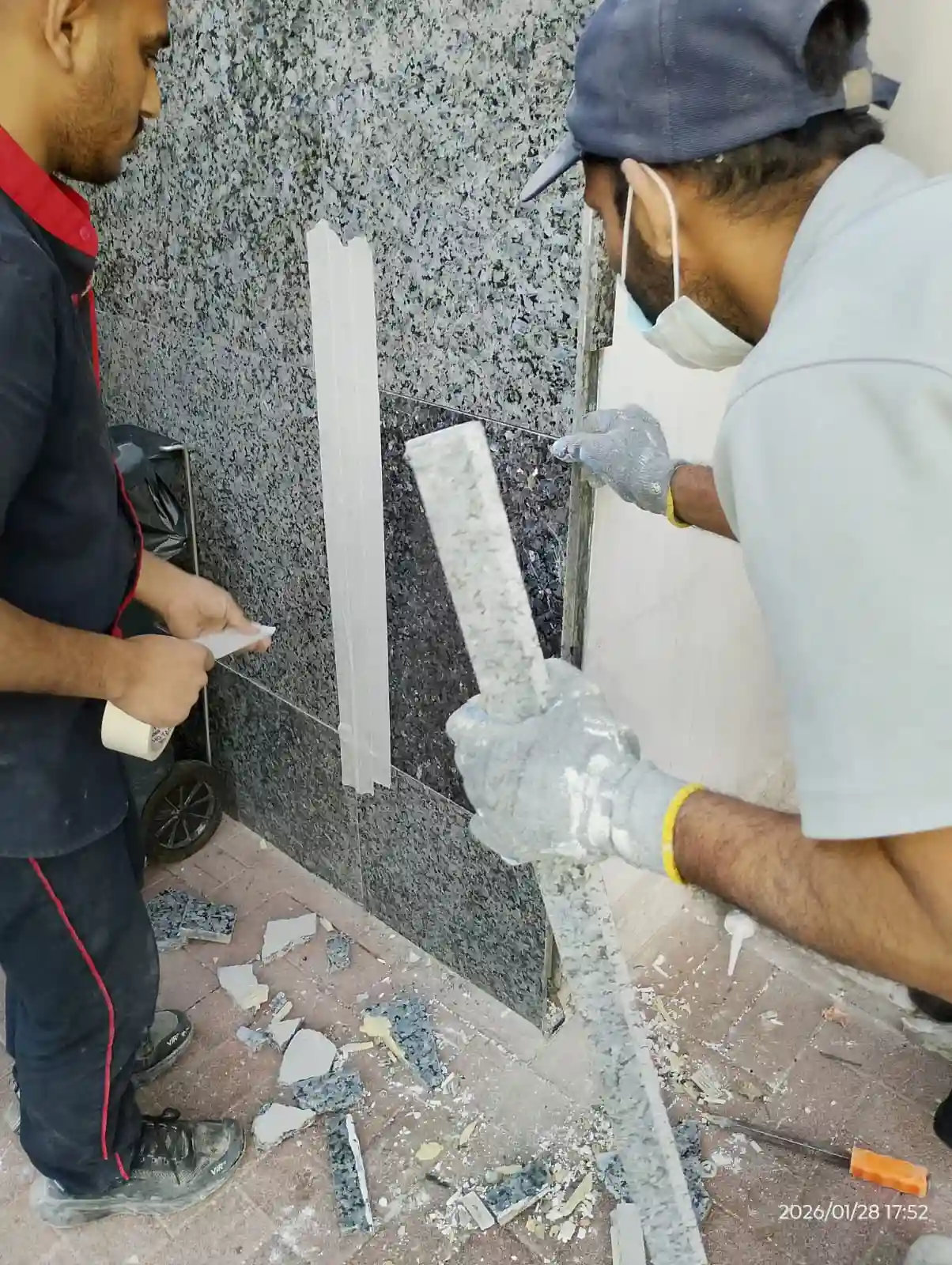 Technicians installing flooring at a Dubai property — supporting project view 2