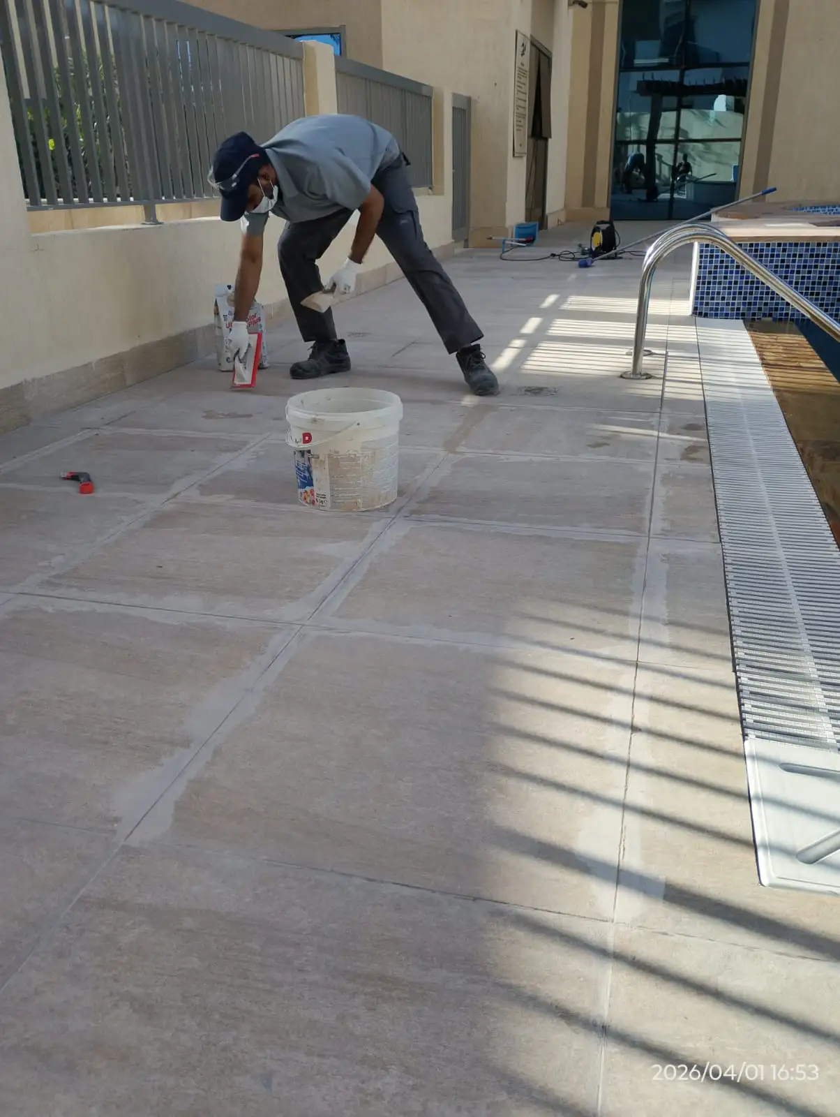 Technicians installing flooring at a Dubai property — supporting project view 1